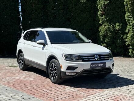 Білий Фольксваген Тігуан, об'ємом двигуна 2 л та пробігом 132 тис. км за 20500 $, фото 1 на Automoto.ua