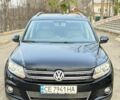 Чорний Фольксваген Тігуан, об'ємом двигуна 2 л та пробігом 260 тис. км за 11300 $, фото 1 на Automoto.ua