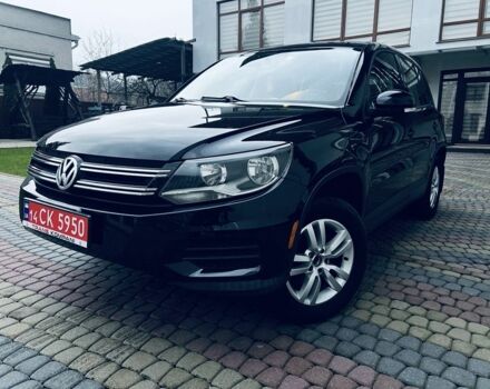 Черный Фольксваген Тигуан, объемом двигателя 2 л и пробегом 185 тыс. км за 9999 $, фото 1 на Automoto.ua