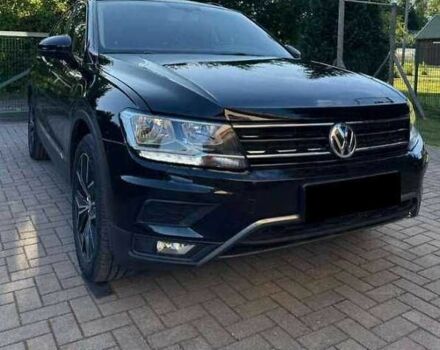 Черный Фольксваген Тигуан, объемом двигателя 2 л и пробегом 98 тыс. км за 15000 $, фото 1 на Automoto.ua
