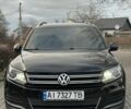 Черный Фольксваген Тигуан, объемом двигателя 2 л и пробегом 107 тыс. км за 13600 $, фото 1 на Automoto.ua