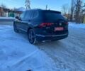 Чорний Фольксваген Тігуан, об'ємом двигуна 2 л та пробігом 56 тис. км за 25100 $, фото 1 на Automoto.ua
