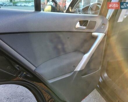 Черный Фольксваген Тигуан, объемом двигателя 1.97 л и пробегом 290 тыс. км за 9899 $, фото 116 на Automoto.ua