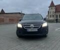 Чорний Фольксваген Тігуан, об'ємом двигуна 2 л та пробігом 222 тис. км за 10050 $, фото 1 на Automoto.ua