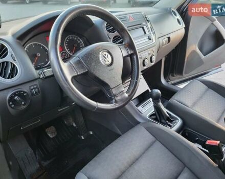 Черный Фольксваген Тигуан, объемом двигателя 1.97 л и пробегом 290 тыс. км за 9899 $, фото 105 на Automoto.ua