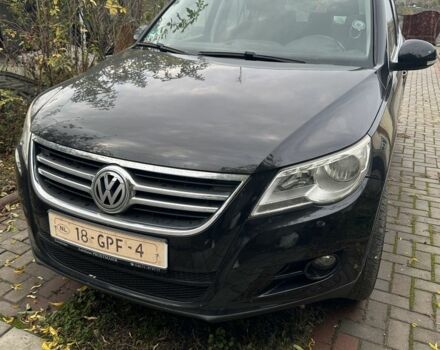 Черный Фольксваген Тигуан, объемом двигателя 1.4 л и пробегом 283 тыс. км за 5589 $, фото 4 на Automoto.ua