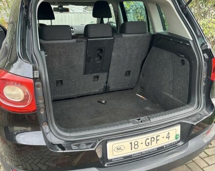 Черный Фольксваген Тигуан, объемом двигателя 1.4 л и пробегом 283 тыс. км за 5589 $, фото 1 на Automoto.ua