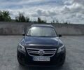 Черный Фольксваген Тигуан, объемом двигателя 1.97 л и пробегом 325 тыс. км за 11500 $, фото 1 на Automoto.ua