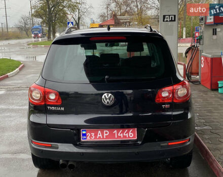 Черный Фольксваген Тигуан, объемом двигателя 1.4 л и пробегом 183 тыс. км за 9300 $, фото 5 на Automoto.ua