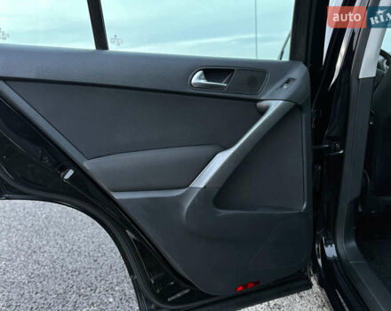 Чорний Фольксваген Тігуан, об'ємом двигуна 1.4 л та пробігом 211 тис. км за 8900 $, фото 43 на Automoto.ua