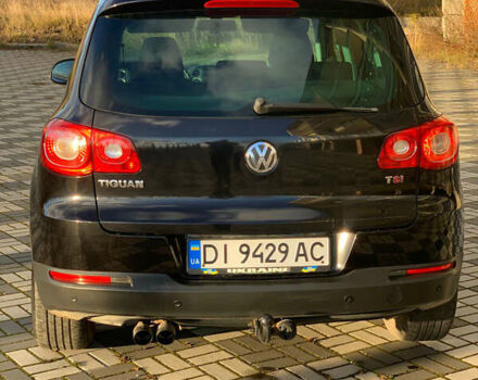 Черный Фольксваген Тигуан, объемом двигателя 1.39 л и пробегом 232 тыс. км за 7950 $, фото 2 на Automoto.ua