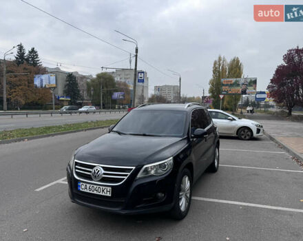 Черный Фольксваген Тигуан, объемом двигателя 2 л и пробегом 275 тыс. км за 9900 $, фото 1 на Automoto.ua