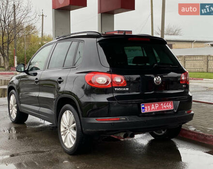 Черный Фольксваген Тигуан, объемом двигателя 1.4 л и пробегом 183 тыс. км за 9300 $, фото 3 на Automoto.ua