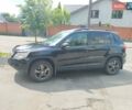 Черный Фольксваген Тигуан, объемом двигателя 1.97 л и пробегом 280 тыс. км за 8900 $, фото 1 на Automoto.ua