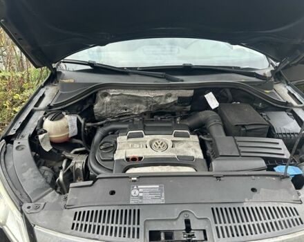 Черный Фольксваген Тигуан, объемом двигателя 1.4 л и пробегом 283 тыс. км за 5589 $, фото 2 на Automoto.ua