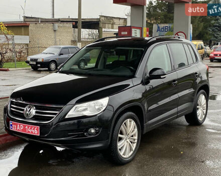 Черный Фольксваген Тигуан, объемом двигателя 1.4 л и пробегом 183 тыс. км за 9300 $, фото 1 на Automoto.ua