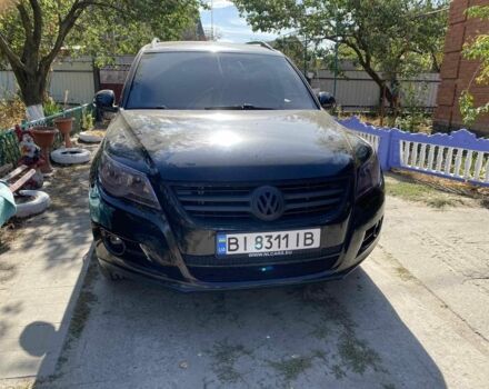 Чорний Фольксваген Тігуан, об'ємом двигуна 1.4 л та пробігом 245 тис. км за 8800 $, фото 1 на Automoto.ua
