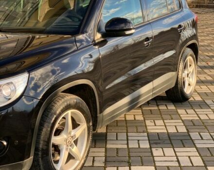 Черный Фольксваген Тигуан, объемом двигателя 1.4 л и пробегом 232 тыс. км за 7950 $, фото 1 на Automoto.ua