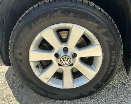 Черный Фольксваген Тигуан, объемом двигателя 1.39 л и пробегом 236 тыс. км за 8800 $, фото 1 на Automoto.ua