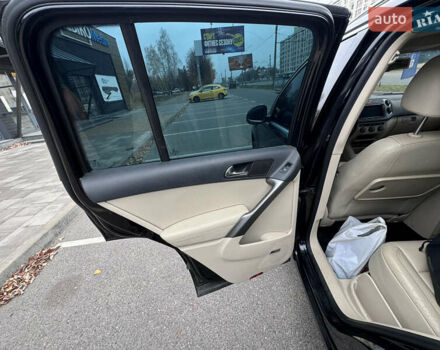 Черный Фольксваген Тигуан, объемом двигателя 2 л и пробегом 275 тыс. км за 9900 $, фото 14 на Automoto.ua