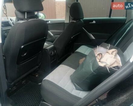 Черный Фольксваген Тигуан, объемом двигателя 1.4 л и пробегом 300 тыс. км за 9300 $, фото 4 на Automoto.ua