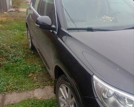 Черный Фольксваген Тигуан, объемом двигателя 1.4 л и пробегом 300 тыс. км за 9300 $, фото 5 на Automoto.ua