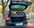 Черный Фольксваген Тигуан, объемом двигателя 1.4 л и пробегом 252 тыс. км за 9100 $, фото 2 на Automoto.ua