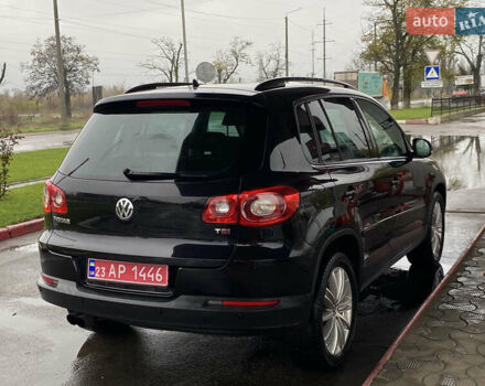 Черный Фольксваген Тигуан, объемом двигателя 1.4 л и пробегом 183 тыс. км за 9300 $, фото 4 на Automoto.ua