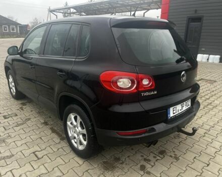 Чорний Фольксваген Тігуан, об'ємом двигуна 2 л та пробігом 280 тис. км за 4663 $, фото 2 на Automoto.ua