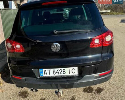Чорний Фольксваген Тігуан, об'ємом двигуна 2 л та пробігом 270 тис. км за 11831 $, фото 1 на Automoto.ua