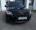 Черный Фольксваген Тигуан, объемом двигателя 2 л и пробегом 280 тыс. км за 9900 $, фото 1 на Automoto.ua