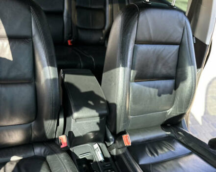 Чорний Фольксваген Тігуан, об'ємом двигуна 2 л та пробігом 270 тис. км за 11500 $, фото 4 на Automoto.ua