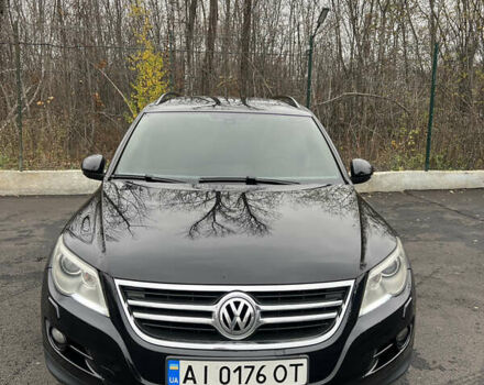 Черный Фольксваген Тигуан, объемом двигателя 1.98 л и пробегом 245 тыс. км за 9400 $, фото 1 на Automoto.ua