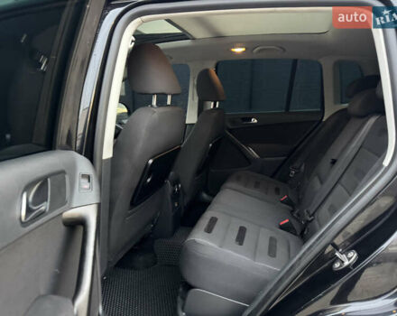 Чорний Фольксваген Тігуан, об'ємом двигуна 2 л та пробігом 290 тис. км за 10200 $, фото 28 на Automoto.ua