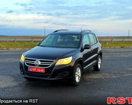 Чорний Фольксваген Тігуан, об'ємом двигуна 1.4 л та пробігом 121 тис. км за 9700 $, фото 1 на Automoto.ua