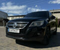 Чорний Фольксваген Тігуан, об'ємом двигуна 2 л та пробігом 270 тис. км за 11500 $, фото 1 на Automoto.ua