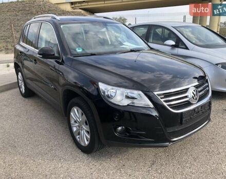 Чорний Фольксваген Тігуан, об'ємом двигуна 1.4 л та пробігом 144 тис. км за 10300 $, фото 2 на Automoto.ua