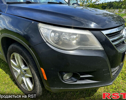 Чорний Фольксваген Тігуан, об'ємом двигуна 2 л та пробігом 309 тис. км за 8700 $, фото 2 на Automoto.ua
