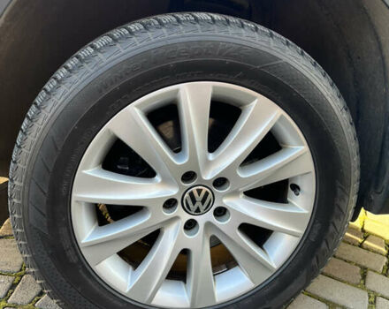 Чорний Фольксваген Тігуан, об'ємом двигуна 2 л та пробігом 170 тис. км за 13900 $, фото 2 на Automoto.ua