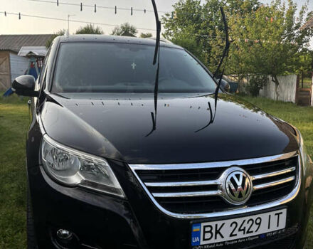 Черный Фольксваген Тигуан, объемом двигателя 1.39 л и пробегом 204 тыс. км за 9700 $, фото 1 на Automoto.ua