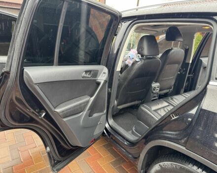 Черный Фольксваген Тигуан, объемом двигателя 2 л и пробегом 285 тыс. км за 13400 $, фото 4 на Automoto.ua