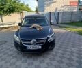 Чорний Фольксваген Тігуан, об'ємом двигуна 1.97 л та пробігом 272 тис. км за 11750 $, фото 1 на Automoto.ua