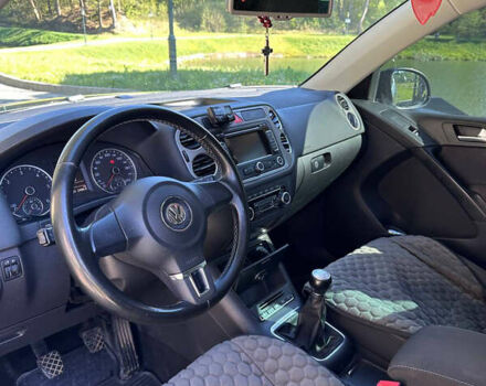 Черный Фольксваген Тигуан, объемом двигателя 2 л и пробегом 317 тыс. км за 10900 $, фото 23 на Automoto.ua