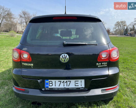 Чорний Фольксваген Тігуан, об'ємом двигуна 2 л та пробігом 260 тис. км за 13000 $, фото 2 на Automoto.ua
