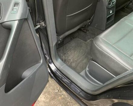 Чорний Фольксваген Тігуан, об'ємом двигуна 2 л та пробігом 199 тис. км за 10700 $, фото 1 на Automoto.ua