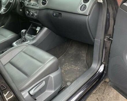 Чорний Фольксваген Тігуан, об'ємом двигуна 2 л та пробігом 199 тис. км за 10700 $, фото 4 на Automoto.ua