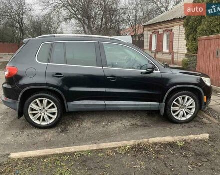 Чорний Фольксваген Тігуан, об'ємом двигуна 2 л та пробігом 199 тис. км за 10700 $, фото 3 на Automoto.ua