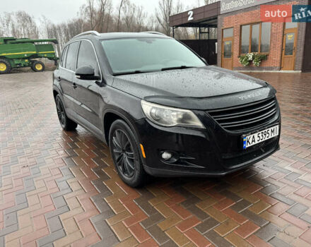 Чорний Фольксваген Тігуан, об'ємом двигуна 2 л та пробігом 285 тис. км за 13500 $, фото 1 на Automoto.ua