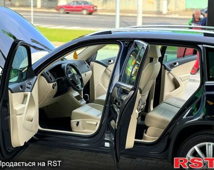 Черный Фольксваген Тигуан, объемом двигателя 2 л и пробегом 283 тыс. км за 9500 $, фото 5 на Automoto.ua