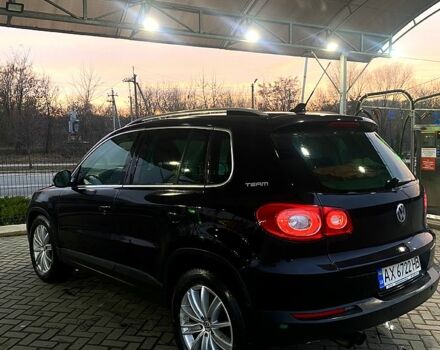 Черный Фольксваген Тигуан, объемом двигателя 2 л и пробегом 212 тыс. км за 11000 $, фото 1 на Automoto.ua
